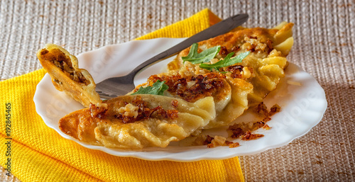 Dumplings with mushrooms and cabbage