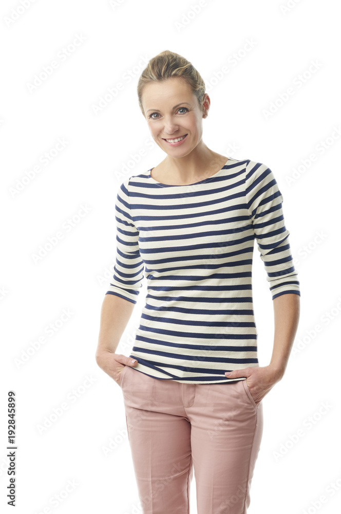 Happy middle aged woman standing at white background Happy middle aged woman standing at white background