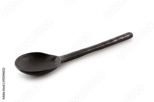 Black Ceramic Spoon isolated on a white background.