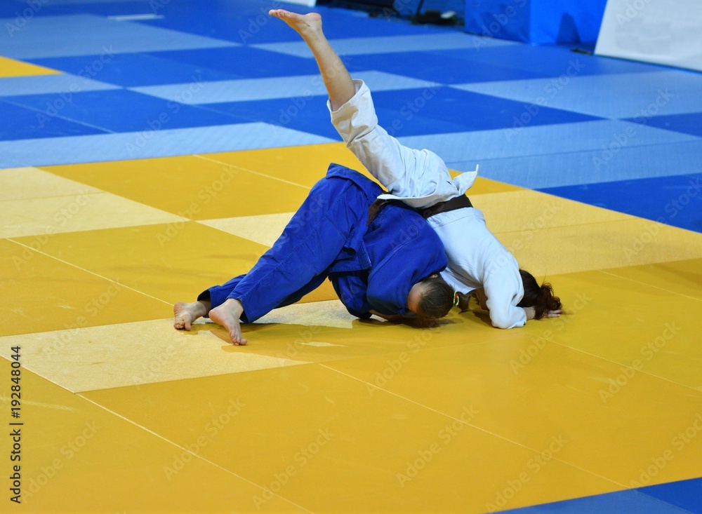 Girls compete in Judo Girls compete in Judo