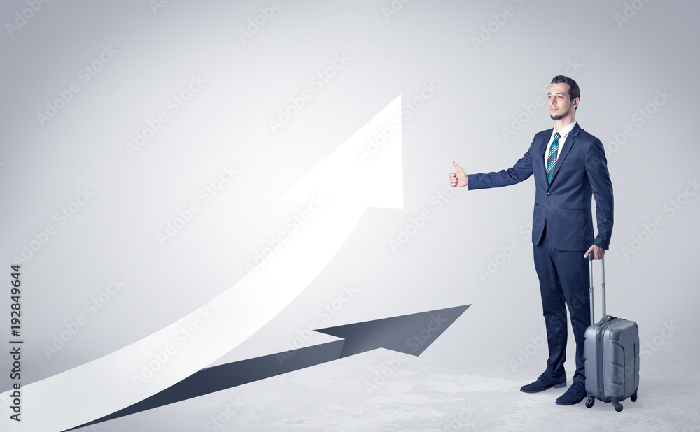 Obraz premium Businessman hitchhiking with progressive arrow