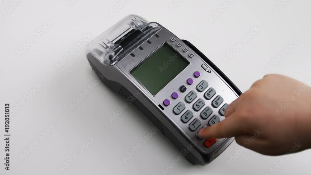 Young boy entering PIN code. Modern technologies in life. Credit card terminal. pos terminal Young boy entering PIN code. Modern technologies in life. Credit card terminal. pos terminal