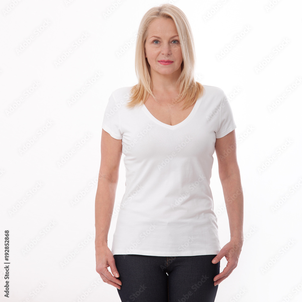 T-shirt design and people concept - close up of woman in blank white t-shirt, shirt front isolated. Mock up. T-shirt design and people concept - close up of woman in blank white t-shirt, shirt front isolated. Mock up.