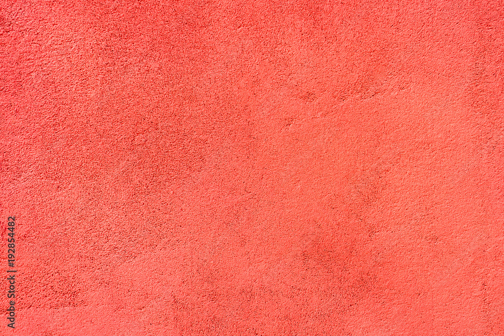 Fototapeta premium Red painted texrured wall.