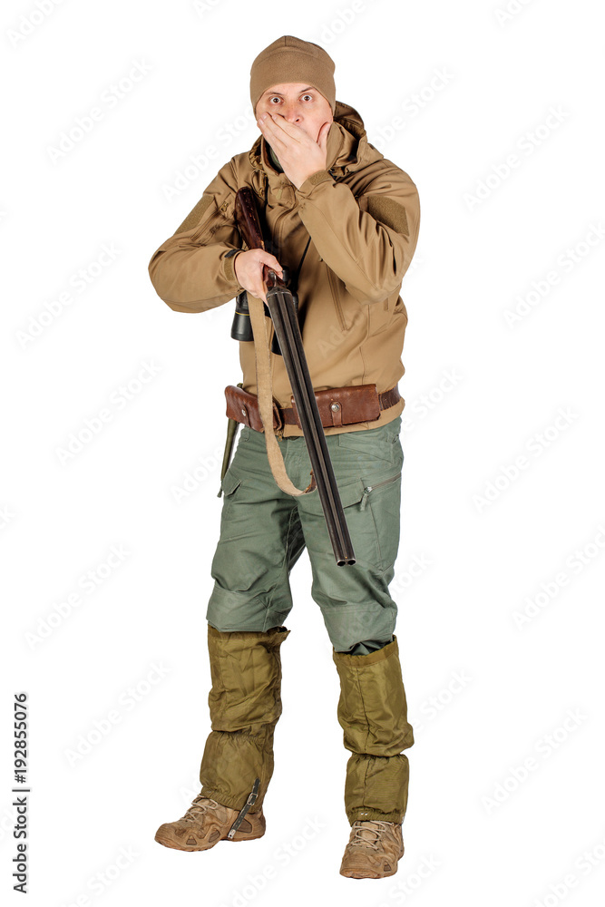 Full length portrait of a male hunter with double barreled shotgun Isolated on white background. hunting and people concept. Full length portrait of a male hunter with double barreled shotgun Isolated on white background. hunting and people concept.