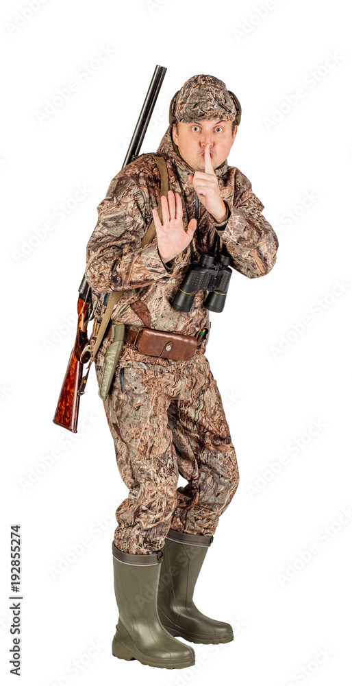 Obraz premium Full length portrait of a male hunter with double barreled shotgun Isolated on white background. hunting and people concept.
