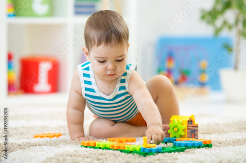 toddler boy playing indoors...
