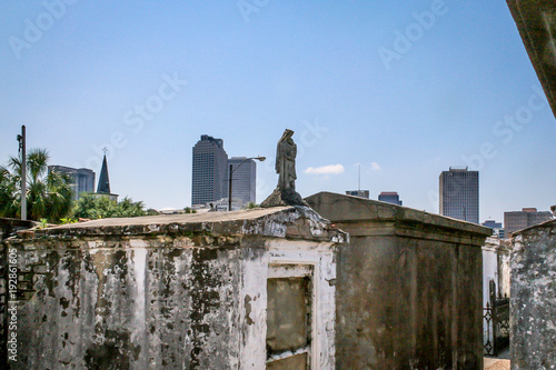 Contrast: One of New Orleans' oldest cemeterys sits with modern New Orleans in the background, April 2012.