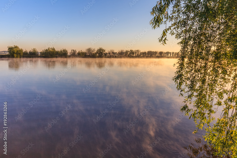 Fototapeta premium sunrise on the lake