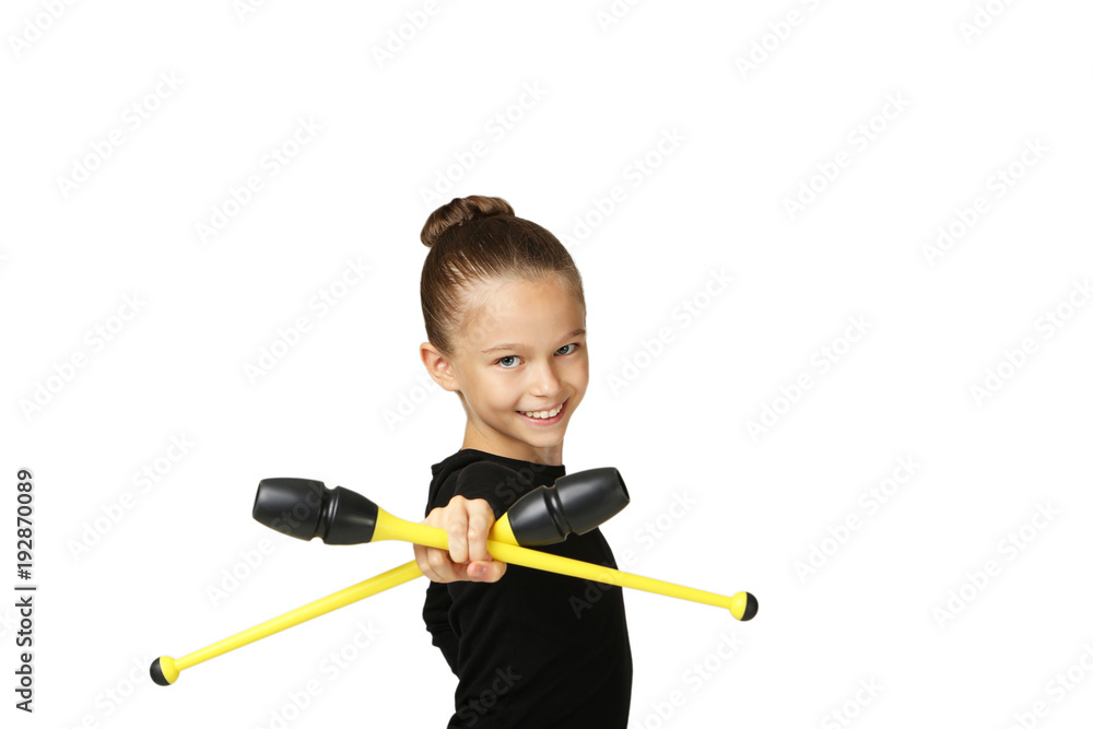 Young girl gymnast with mace on grey background Young girl gymnast with mace on grey background