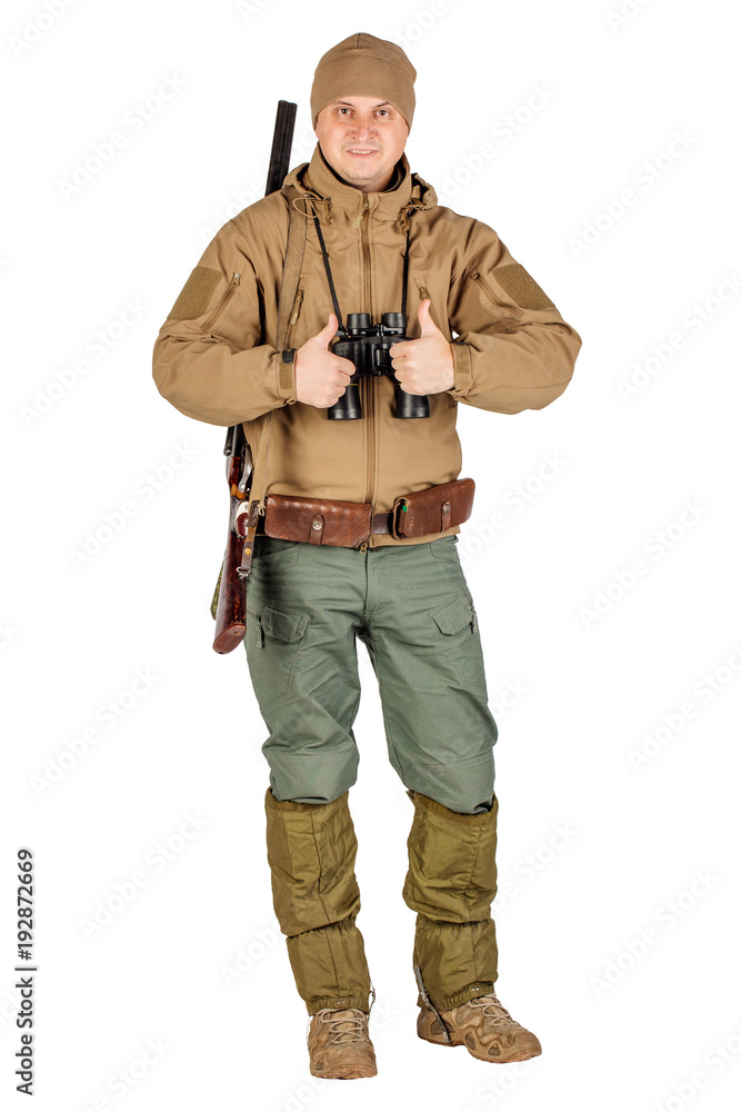 Full length portrait of a male hunter with double barreled shotgun Isolated on white background. hunting and people concept. Full length portrait of a male hunter with double barreled shotgun Isolated on white background. hunting and people concept.