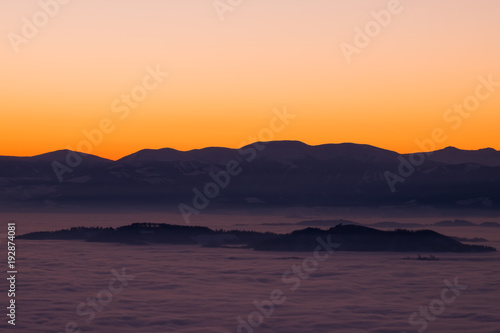 View from mountain Schoeckl over low stratus to Pack  sunset