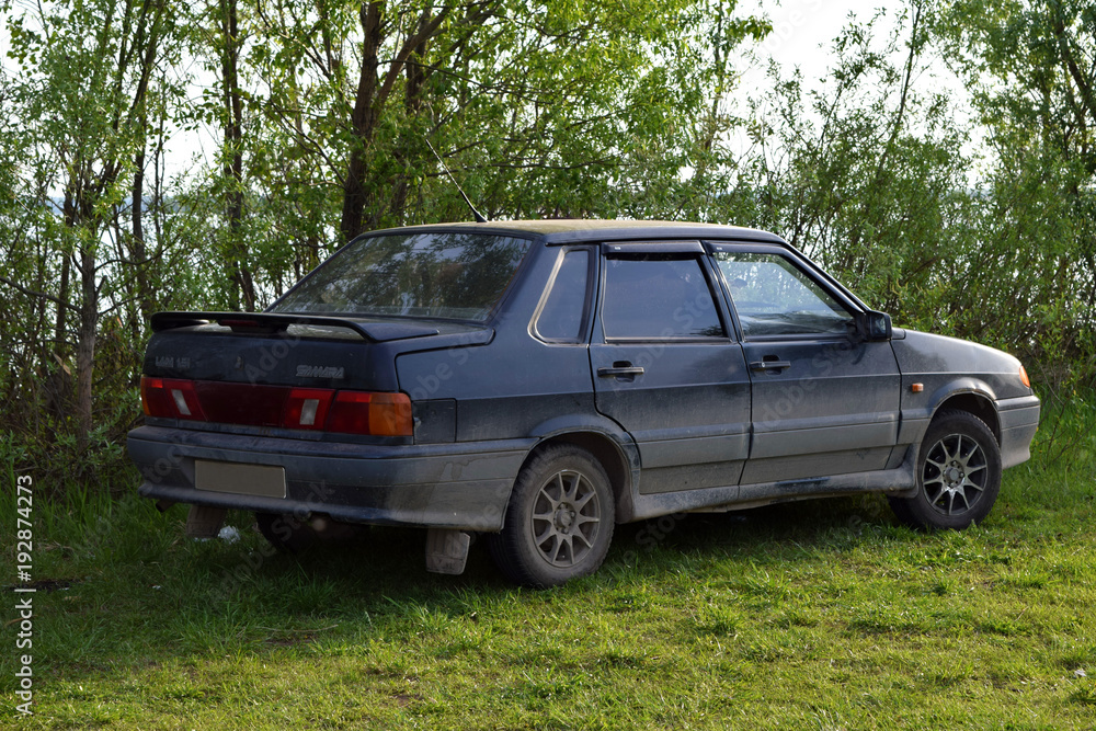 Car VAZ-21153 on the nature by the river