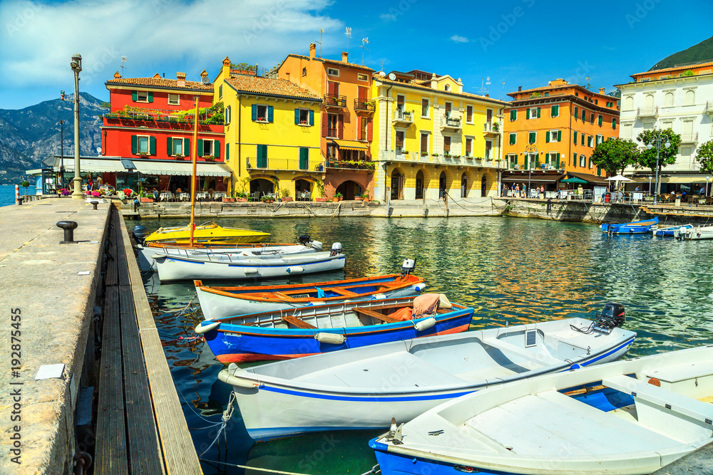 Colorful boats in harbor of Malcesine, Veneto region, Italy, Europe