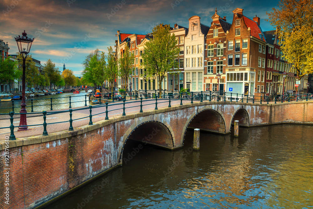 Fantastic water canals with bridges and colorful houses, Amsterdam, Netherlands
