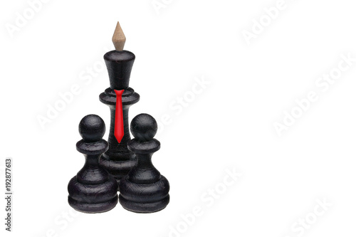 boss in red tie and two assistants made from wooden black chess queen and couple of pawns, isolated on white background