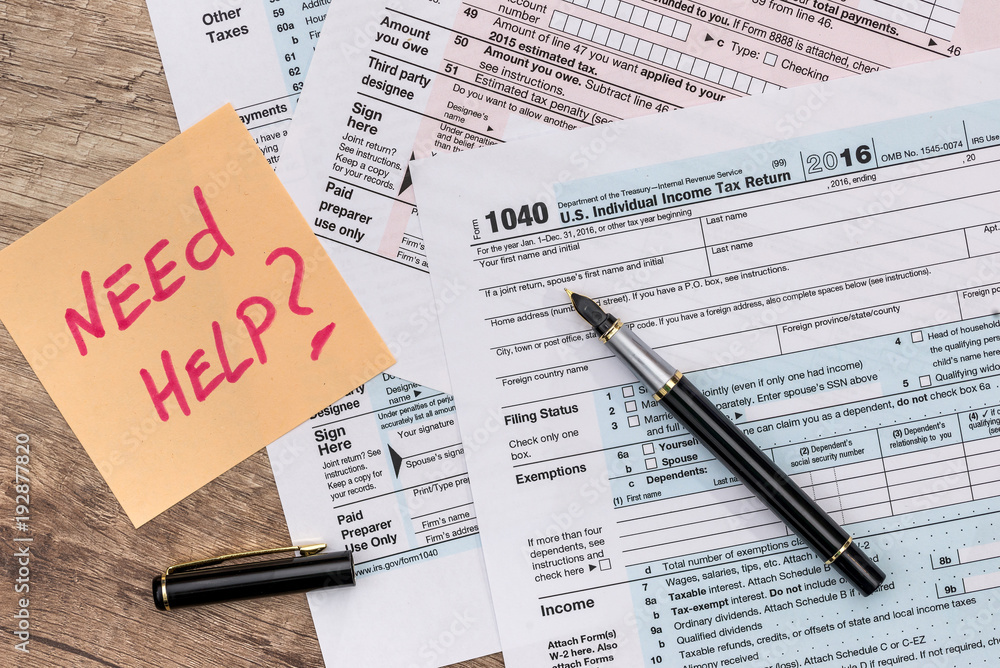 Obraz premium 1040 tax form with sticker - need help