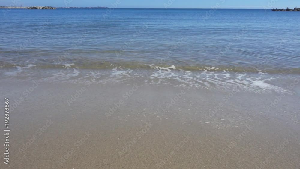 Quiet and calm mediterranean beach on the Costa Daurada in the beautiful city of Cambrils, Spain. Quiet and calm mediterranean beach on the Costa Daurada in the beautiful city of Cambrils, Spain.
