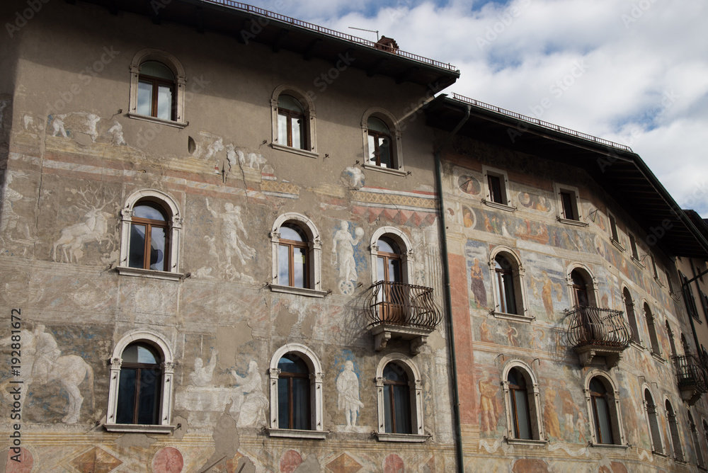 Trento, Italy, two picturesque houses at the Duomo, frescoed