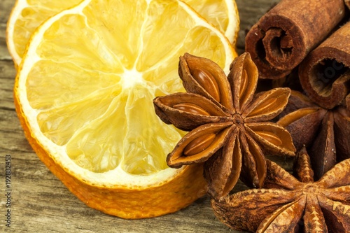 Dried slice of lemon and star anise. Sale of spices. Aromatic spices.