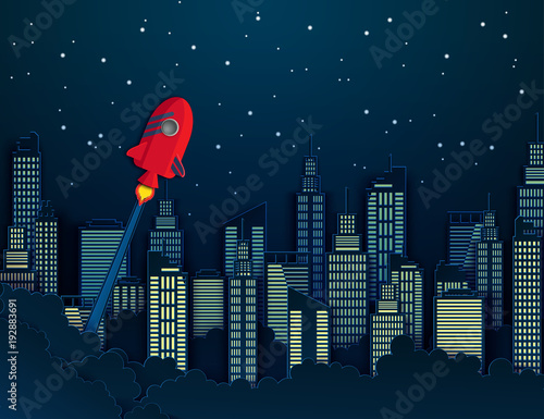 Paper art of space shuttle launch to the sky.  Modern nidht city skyline building industrial paper art landscape skyscraper offices, clouds. Start up business concept and exploration idea photo