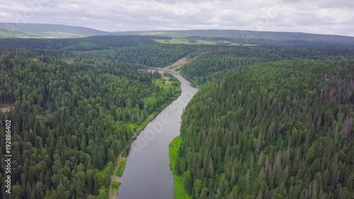 Gorgeous aerial panoramic view on the touristic part of the river at sunset. Clip. Beautiful natural landscape at summer. Europe photo