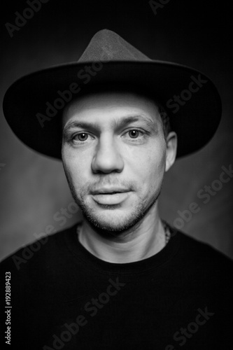 portrait of a guy in a gangster hat