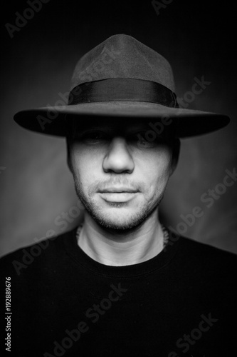 portrait of a guy in a gangster hat © Egor  Terentev