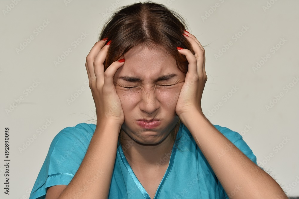 Stressed Young Female Nurse Stressed Young Female Nurse