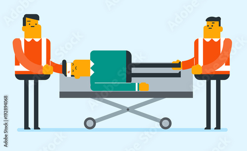 Caucasian white emergency doctors transporting victim after accident on the stretcher