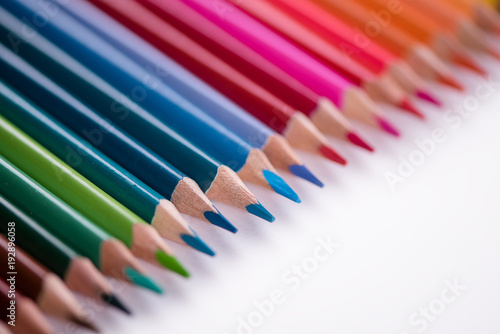 colour pencils on white background back to school concept