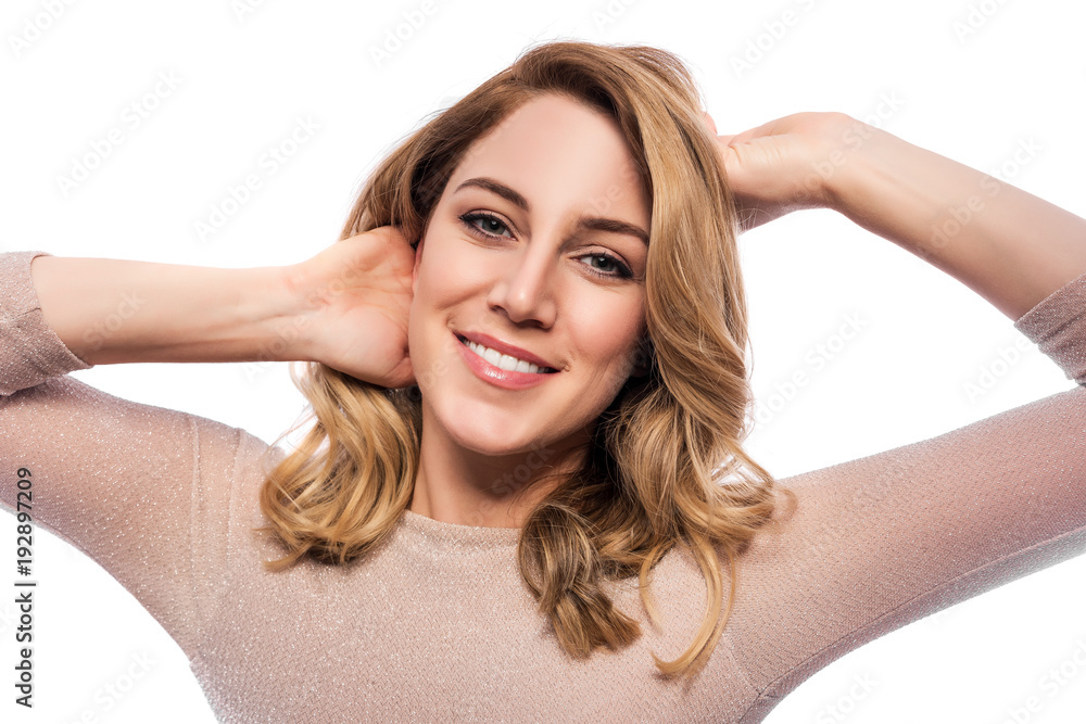 Attractive blond young woman. Portrait of a beautiful woman on a white background.