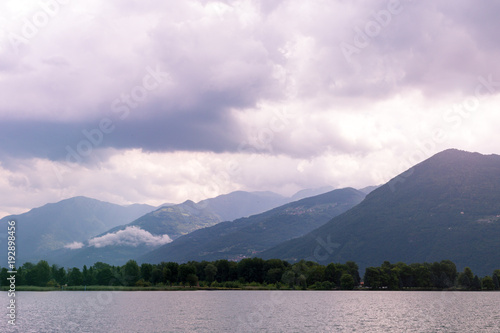 Lake in the mountains on a cloudy summer day.