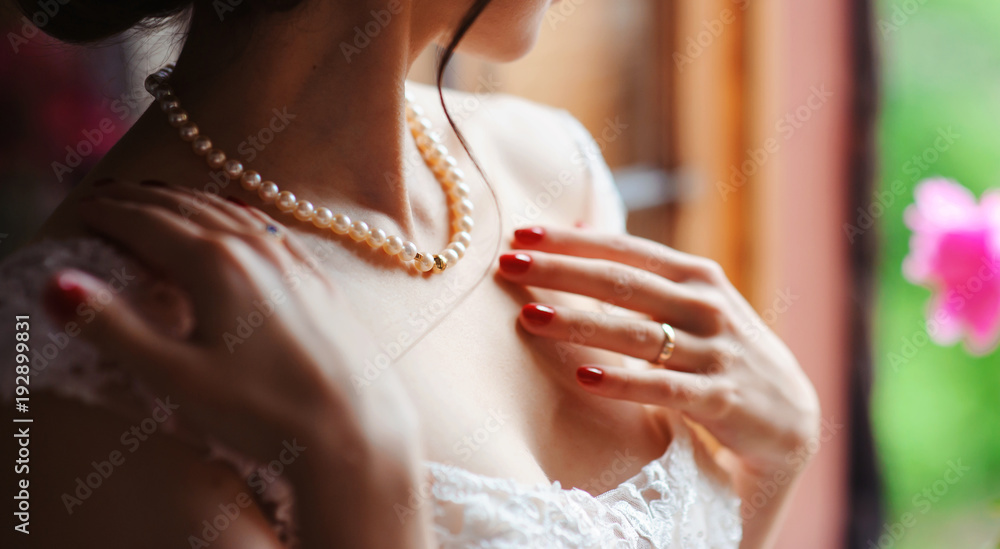 bride and wedding concept - beautiful woman with diamond engagement ring close up macro