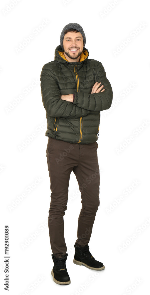 Young man in warm clothing on white background. Ready for winter vacation Young man in warm clothing on white background. Ready for winter vacation