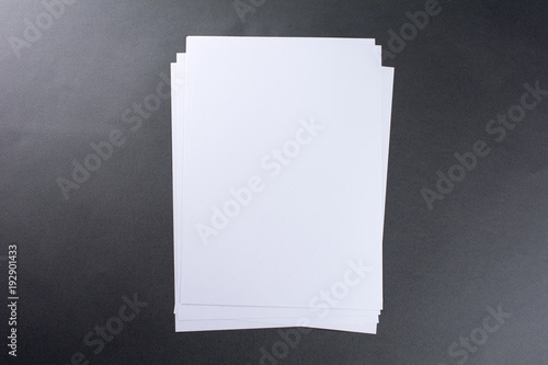 Blank sheets of paper gray background