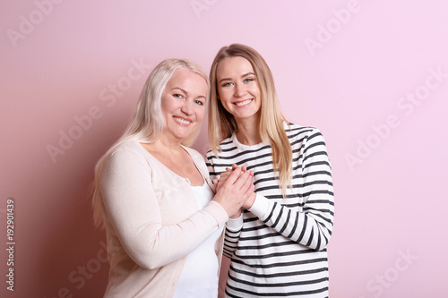 Young daughter and mother o...
