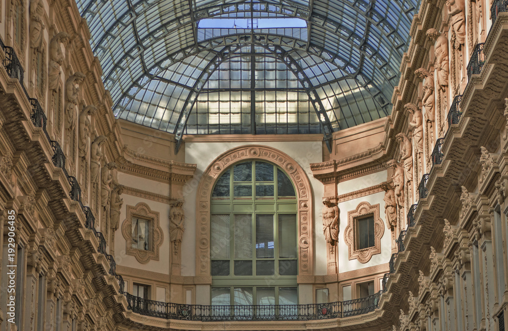 stuccos, frescoes and iron decorations of the Vittorio Emanuele gallery in Milan, Italy
