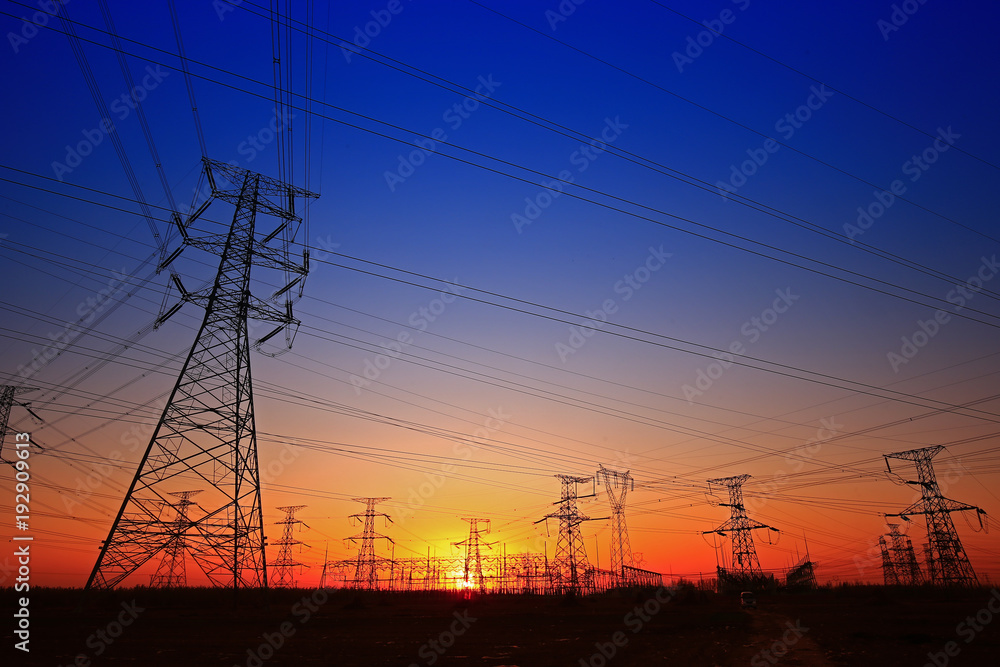 Sunset silhouette of pylon