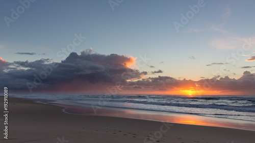 Vibrant beach sunrise