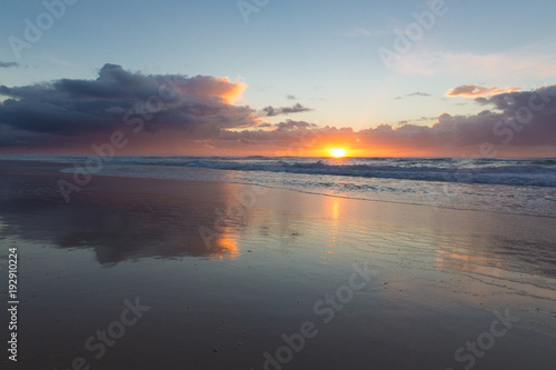 Vibrant beach sunrise © Andre D