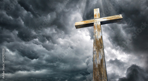 Obraz na plátně Cross against the sky. Happy Easter. Christian symbol