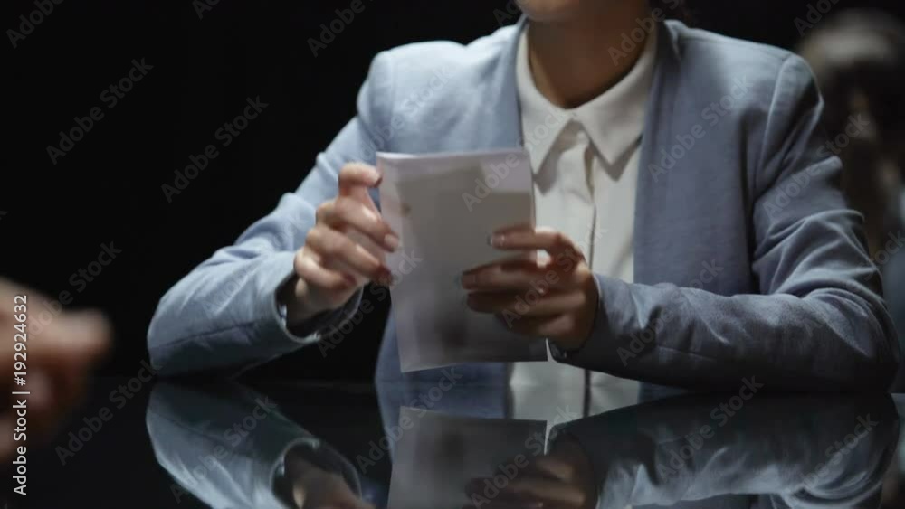 Businesswoman taking envelope with money, corruption and tax evasion, close up Businesswoman taking envelope with money, corruption and tax evasion, close up