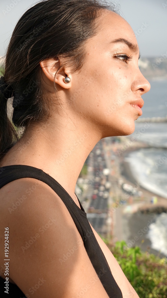 Serious Female Teen Watching Coastline Serious Female Teen Watching Coastline