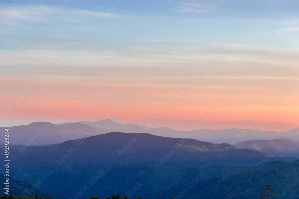 Mountain ranges in Carpathian Mountains at sunset