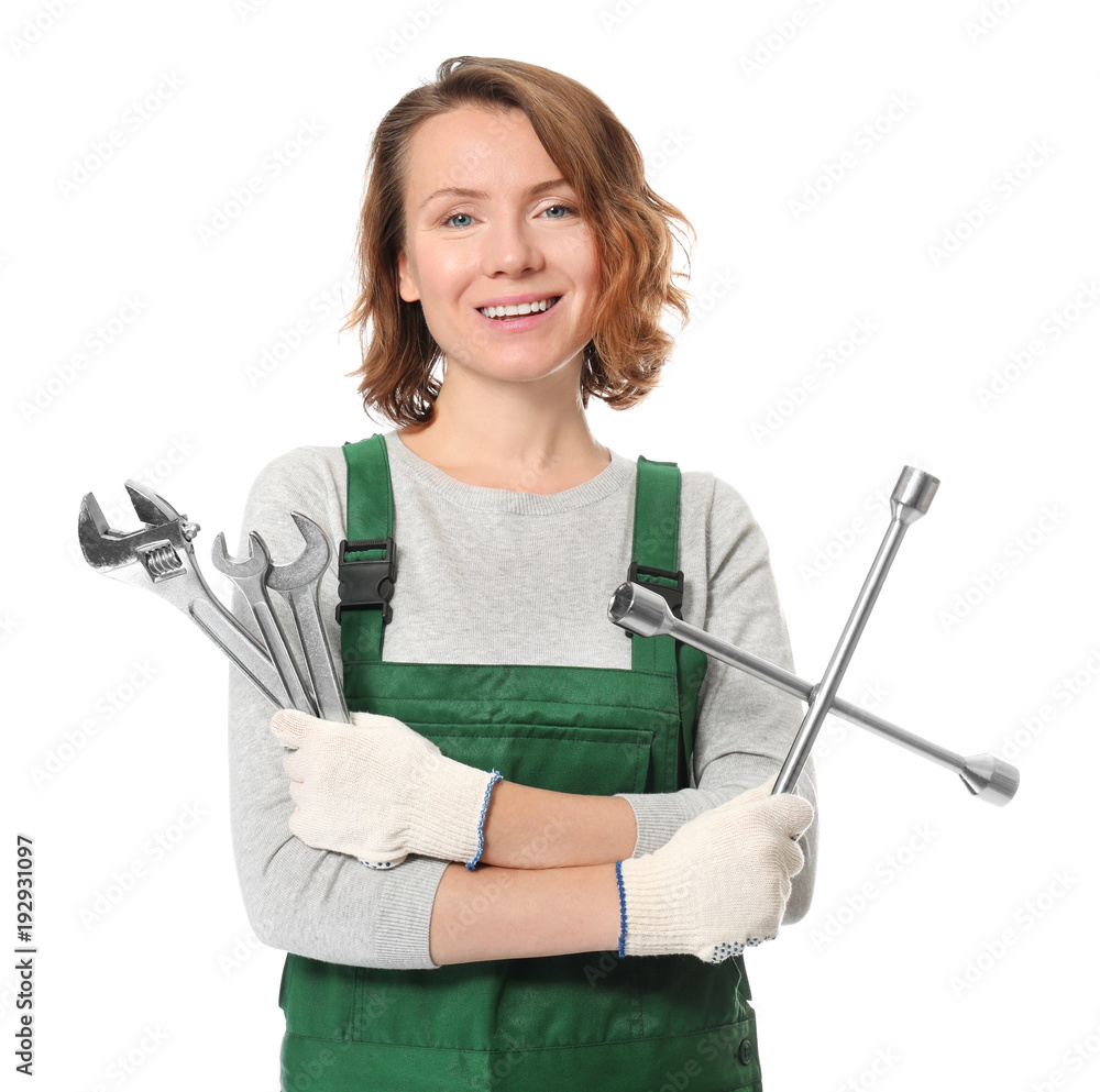 Female auto mechanic with tools on white background Female auto mechanic with tools on white background