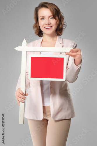 Real estate agent with blan...