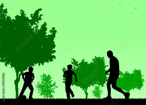 Daddy and sons playing football in park, one in the series of similar images silhouette