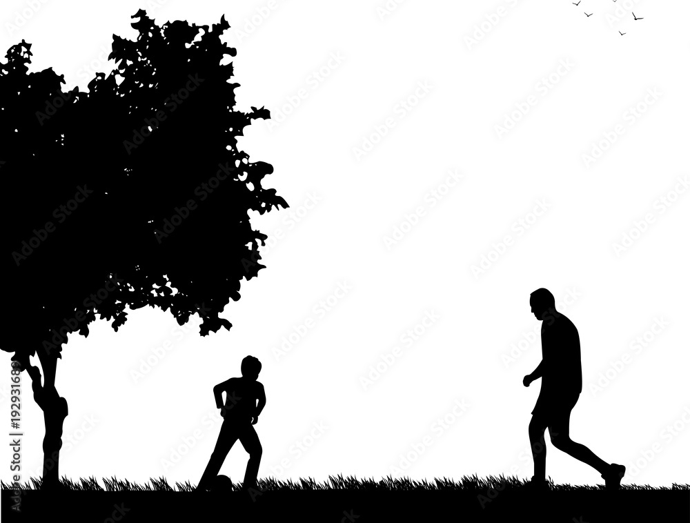 Daddy and son playing football in park, one in the series of similar images silhouette Daddy and son playing football in park, one in the series of similar images silhouette