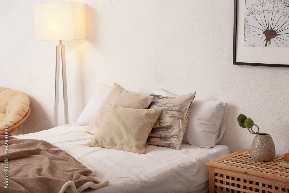 Fototapeta Comfortable double bed in modern stylish interior